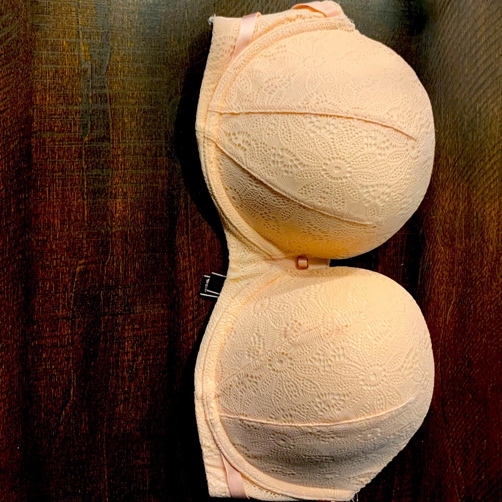 Victoria’s Secret pale pink, strapless bra.